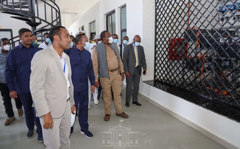 President Uhuru Kenyatta (in a white face mask) and Ethiopian PM Abiy Ahmed(third left) inaugurate the Moyale Border Post.