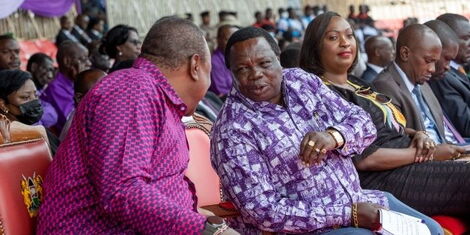 President Uhuru Kenyatta (middle) and COTU Secretary General Francis Atwoli during the Labour Day celebrations at the Nyayo Stadum on May 1, 2022. (1).jpg