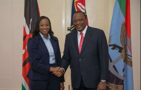 President Uhuru Kenyatta (right) greets State House Spokesperson Kanze Dena at State House in June 2018