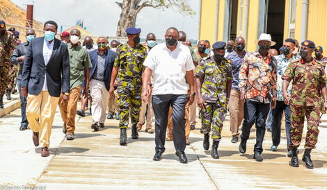 President Uhuru Kenyatta and ODM leader Raila Odinga at the Kenya Naval Base in Mtongwe, Mombasa on Friday, December 17, 2021.