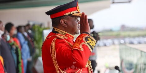President Uhuru Kenyatta salutes