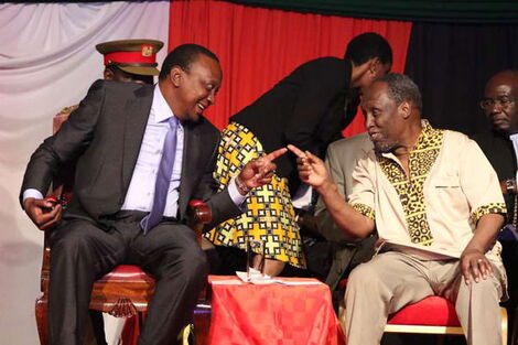 President Uhuru Kenyatta shares a light moment with famous writer Ngugi wa Thiong'o
