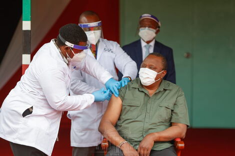 President Uhuru Kenyatta receiving Covid-19 vaccine on March 26, 2021 at State House, Nairobi.