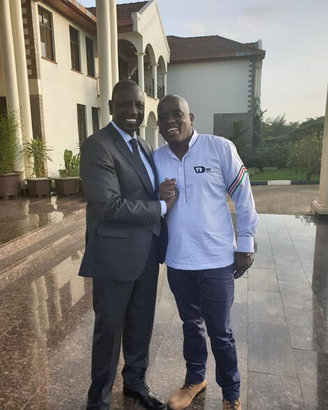 President William Ruto (left) and Digital Strategist Dennis Itumbi (right) posing for a photo in December 2018