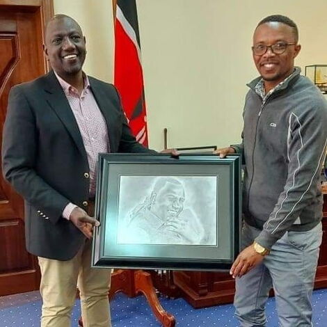 President William Ruto (left) and artist Fred K Kapenso (right) holding a drawing at Karen on August 2, 2021