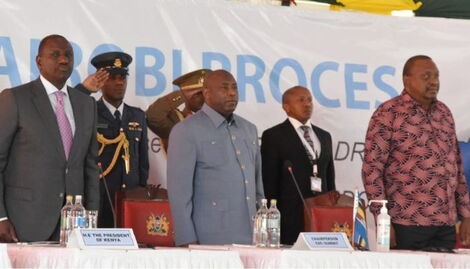 President William Ruto (left), his predecessor Uhuru Kenyatta (right) and other leaders in Nairobi on Monday, November 28, 2022.