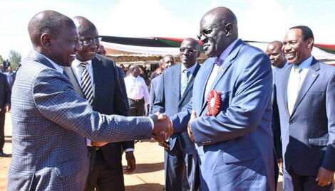 President-elect William Ruto (left) greets former Education CS George Magoha at a previous position.