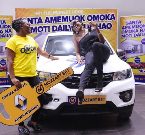 Rachael Kasongo Muyangu poses for a photo inside her Renault Kwid on Tuesday, December 14, after winning the Mozzart Bet Omoka na Moti promotion.