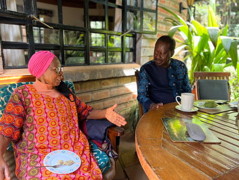 ODM Party Leader Raila Odinga speaking to Prof. Eddah Gachukia when he visited their Kandara home in Murang'a County of Saturday January 29, 2022