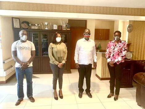 Former Prime Minister Raila Odinga poses with Nairobi County Assembly Speaker Beatrice Elachi (far right) and other leaders from the County Assembly at his Capitol Hill office in Nairobi on March 15, 2020