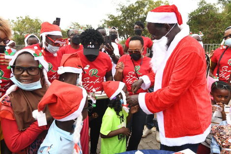 ODM leader Raila Odinga hosts orphans at a Christmas party in Kisumu on Friday, December 24, 2021.