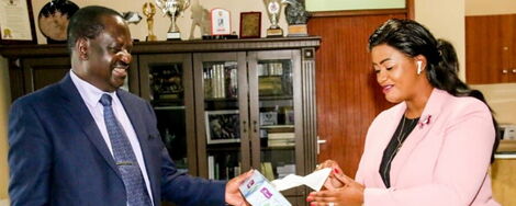 ODM leader Raila Odinga with Laikipia Women Representative Cate Waruguru at Capitol Hill office, Nairobi on Tuesday, June 9, 2020