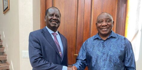 ODM party leader Raila Odinga (left) greets South African President Cyril Ramaphosa at his private residence in Johannesburg on January 21, 2023. 
