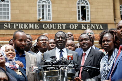 Undated image of ODM leader Raila Odinga addressing the media outside the Supreme Court building