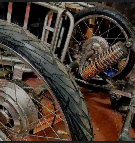 Rear tyre suspension of the electric wheelchair