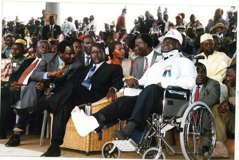 Retired President Mwai Kibaki with ODM leader Raila Odinga and Wiper's Kalonzo Musyoka during his swearing in