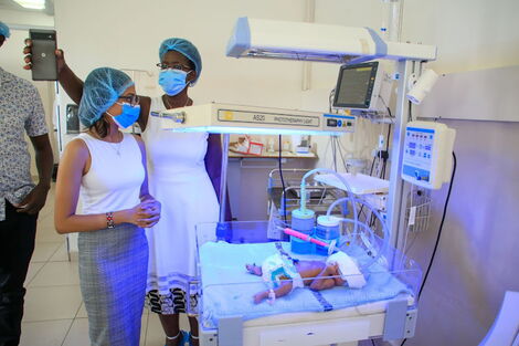 Revital Healthcare technical director Krupali Shah and Kisumu county First Lady Dorothy Nyong'o at the Coast General Teaching and Referral Hospital neonatal unit