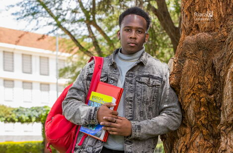 A Riara University student poses for a photo at the institution 