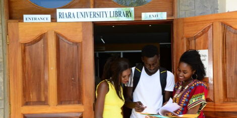 Riara University students outside the institution's library 