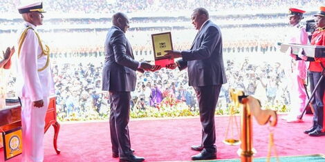 President William Ruto receives instruments of power from his predecessor, Uhuru Kenyatta, on Tuesday, September 13, 2022 at Kasarani Stadium 