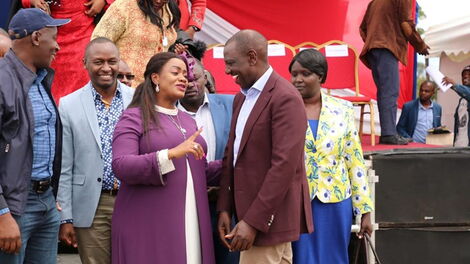 File image of DP William Ruto (right) with Laikipia Women Representative Cate Waruguru (centre)