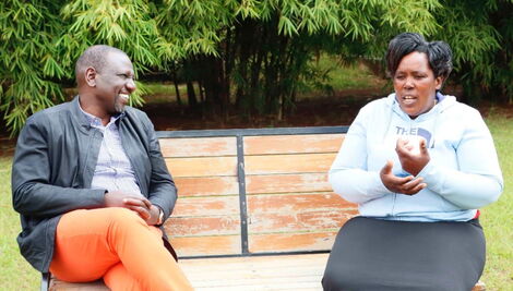 DP Ruto and a Mama Elizabeth Mueni enjoy a light moment on Friday, July 9, 2021