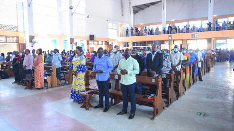Ruto (middle) at a Sunday mass at the St. Patrick’s Catholic Church in Kilifi North on July 18, 2021.