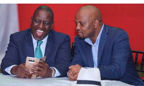 Deputy President William Ruto (left) with Gatundu South MP Moses Kuria at a private wedding at Greens Golf Resort, Thika on Friday, November 29, 2019.