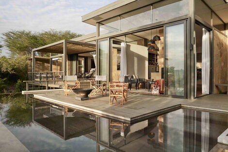 An image of the front view of one of the suites inside the Olonana Sanctuary.