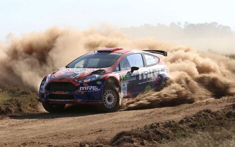Manvir Baryan, navigated by Drew Sturrock, driving Ford Fiesta, goes through the competitive stage at the Chemweno farm in Moi Ben, Uasin Gishu during the KCB Eldoret Rally on October 8, 2016.