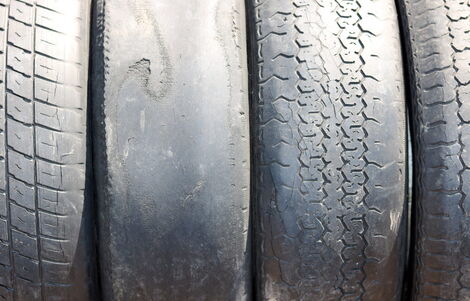 Several worn-out tyres