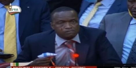 Sigowet Soin MP Benard Koros pictured bleeding as he holds a handkerchief in Parliament on Wednesday, December 31.
