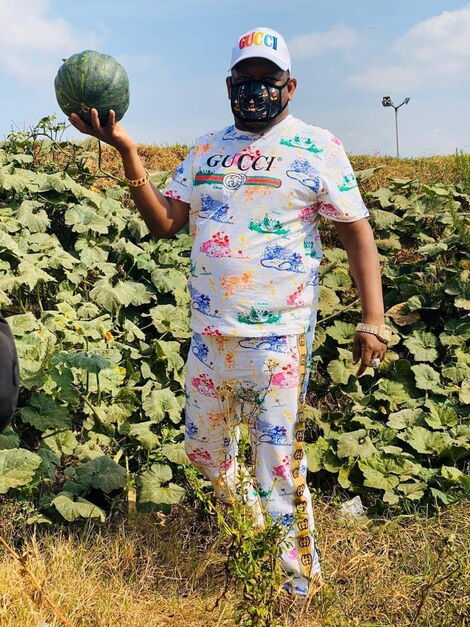 Mike Sonko poses for a photo at his Mua Farm