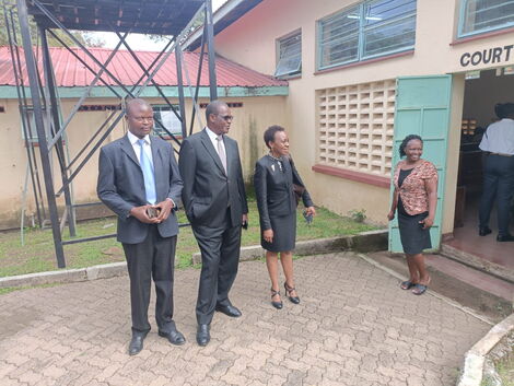 Former Nairobi Governor Evans Kidero (centre) and his lawyer Julie Soweto during the hearing of his petition against the election of Gladys Wanga at the Homa Bay High Court on October 7, 2022.