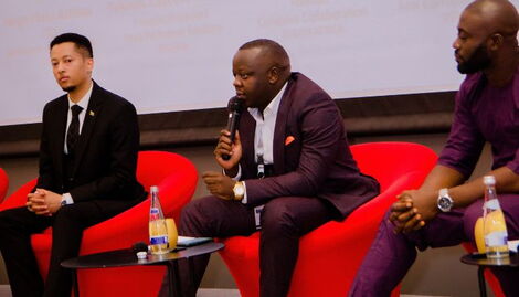 SpotOn CEO Mark Steve (right) speaks during the Pan African Youth Leadership Foundation Global summit.