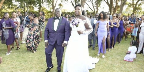 Stacey Kositany's and Sam Chelang'a during their weddingon March 19, 2022.