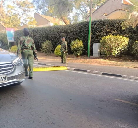 An image of police officers on a roadblock leading to State House, Nairobi.