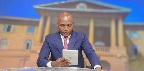 Citizen TV's Stephen Letoo poses for a photo inside the station's studio on August 30, 2022.