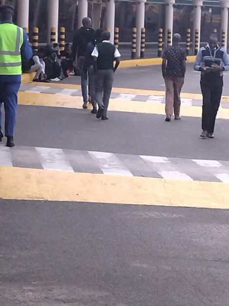 Kisii High School student at JKIA after his fully paid trip to Nairobi.