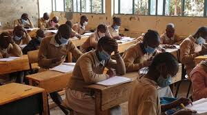 Students during a lesson in class wearing masks