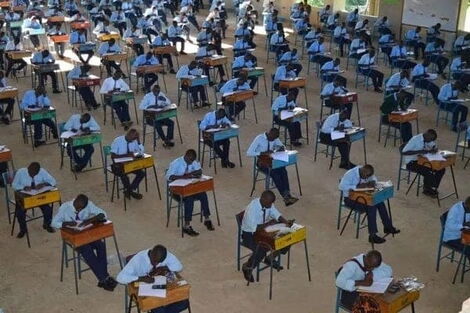 Students take a Kenya Certificate of Secondary Examination (KCSE) exam