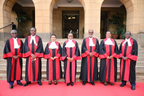  Justices Isaac Lenaola, Smokin Wanjala, Philomena Mwilu (DCJ), Martha Koome (CJ), Ibrahim Mohammed, Njoki Ndungu and William Ouko outside the apex court premises on Thursday, March 31, 2022