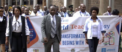 TSC Chairman Dr Jamleck Muturi John, Commissioner Annceta Wafukho and CEO Dr Nancy Macharia lead teachers in the World Teachers Day Kenya procession at Kenya School of Government on October 5, 2022. 