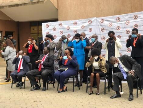 undated photo of TSC CEO posing for a photo with a selection panel tasked with recruiting new commissioners