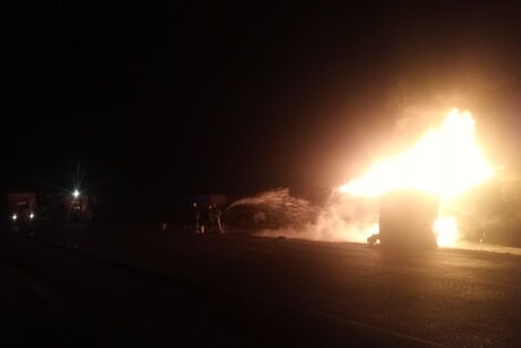 Firefighters putting out fire after a petrol tanker exploded on August 26, 2021, along Eldoret-Webuye road, in Kakamega County,