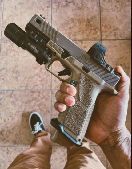The ZEV Technologies OZ9 pistol identical to that of Craighead