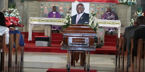 The body of the late Geogr Magoha laying in a casket during his reuiem mass at Consolata Church in Nairobi on February 9, 2023.