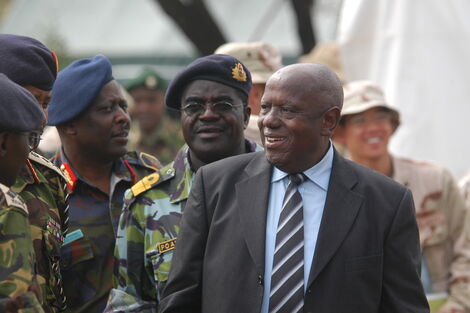 The late billionaire Njenga Karume (in a suit).