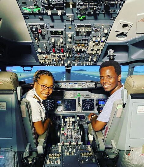 File photo of Tim Njiru (right) with a co-pilot inside a plane's cockpit