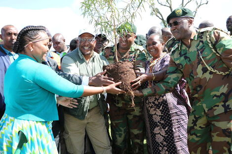 From left: Samburu West MP Naisula Lesuuda, Environment CS Keriako Tobiko, KFS Chief Conservator of Forests Julius Kamau and Samburu woman representative Maison Leshomo plant trees in Kirisia forest on December 30, 2019